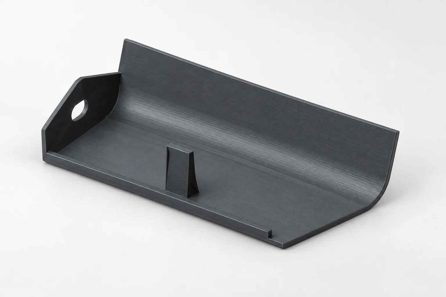 Model-based studio visualization of left Front Rocker Molding Cover for Dodge Caravan in charcoal-gray printed plastic.