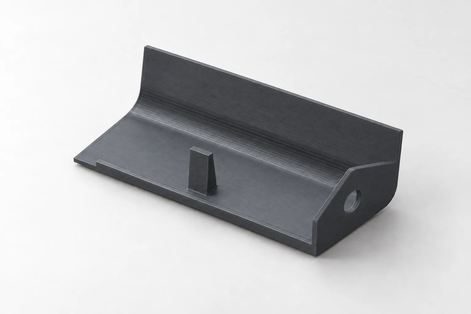Model-based studio visualization of right Front Rocker Molding Cover for Dodge Caravan in charcoal-gray printed plastic.