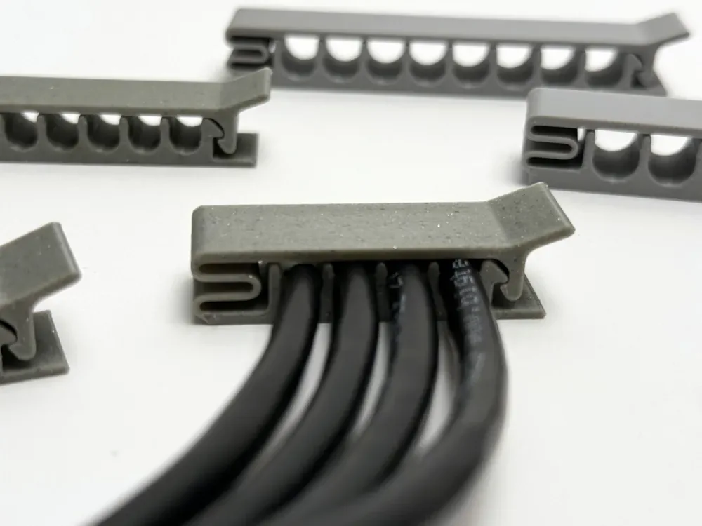 Creator design reference for Four-Cable Holder — 6 mm Cable Design; included printed parts are specified in the listing.