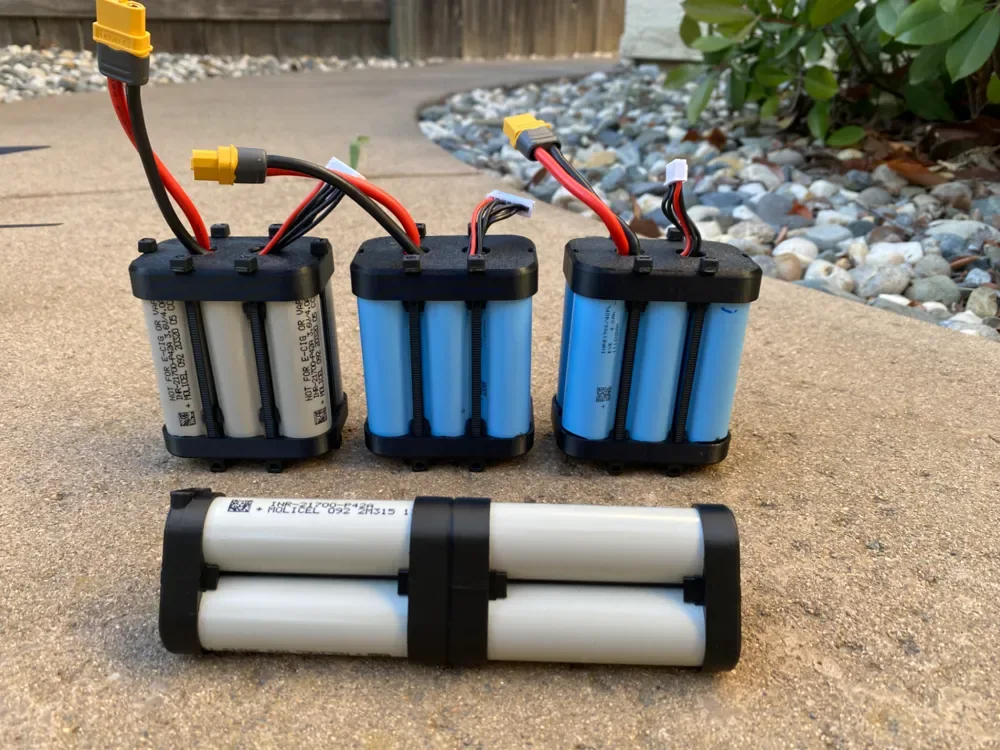 Creator design reference for 21700 Battery Pack Housing — Four Cell; included printed parts are specified in the listing.