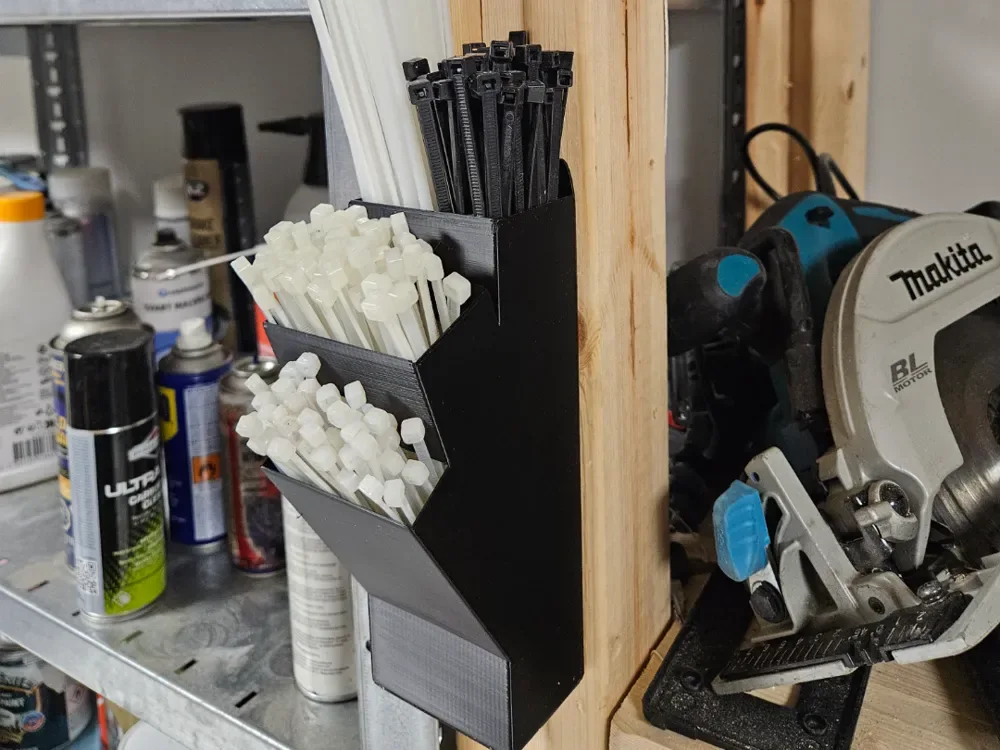 Creator design reference for Wall-Mounted Zip Tie Organizer; included printed parts are specified in the listing.