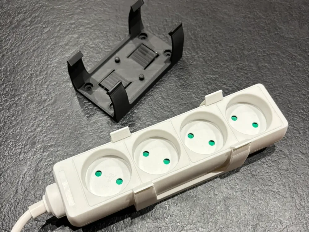 Creator design reference for Power Strip Mounting Bracket; included printed parts are specified in the listing.