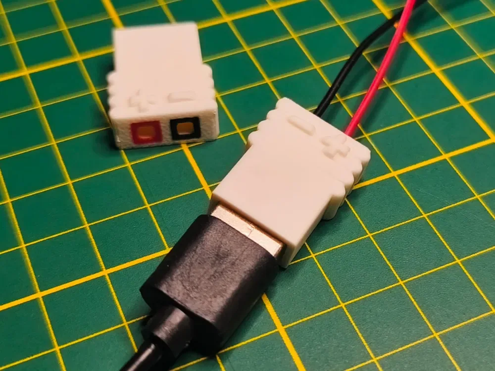 Creator design reference for USB-A to Dupont Adapter Housing; included printed parts are specified in the listing.