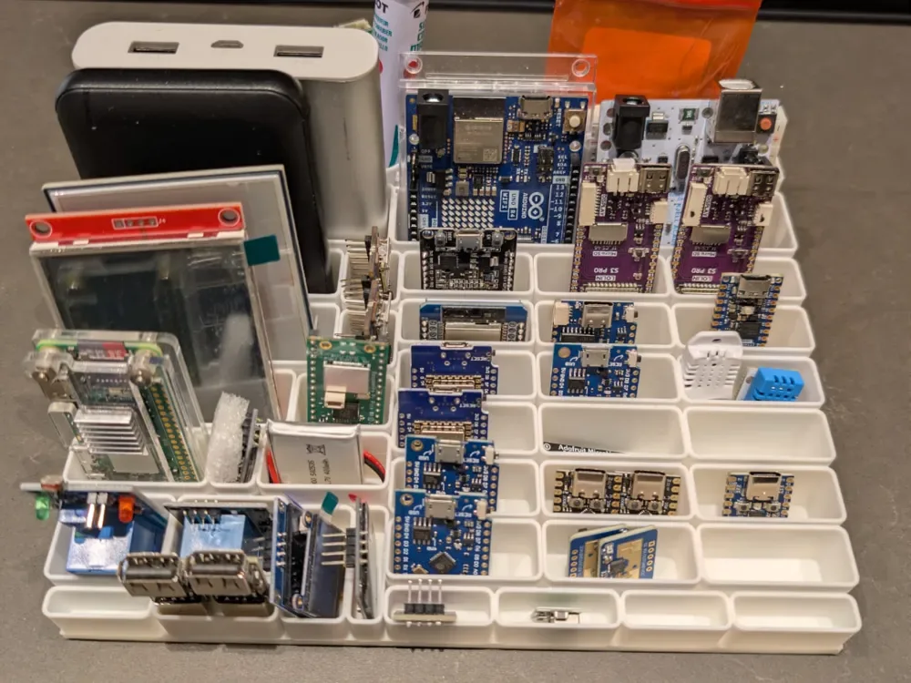 Creator design reference for Development Board and Cell Organizer; included printed parts are specified in the listing.