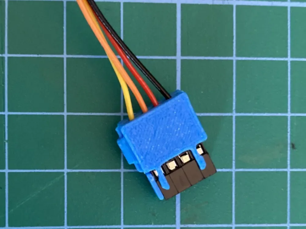 Creator design reference for Four-Pin Dupont-to-JST XH Adapter Housing; included printed parts are specified in the listing.