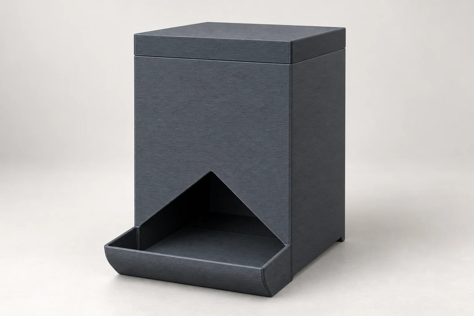 Model-based studio visualization of one utility storage dispenser with its fitted lid and empty front tray.